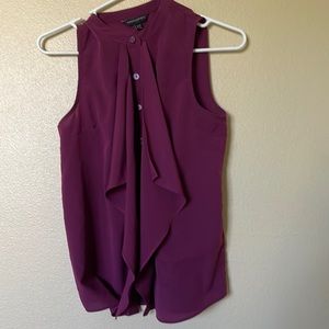 Ruffled front sleeveless button down shirt